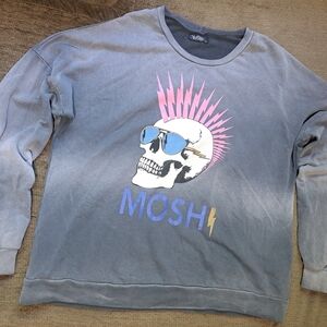 Stay stylish with the Gray Skull Graphic Sweater. Featuring a bold skull design